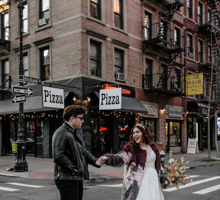 Bride & groom walk through the streets of New York