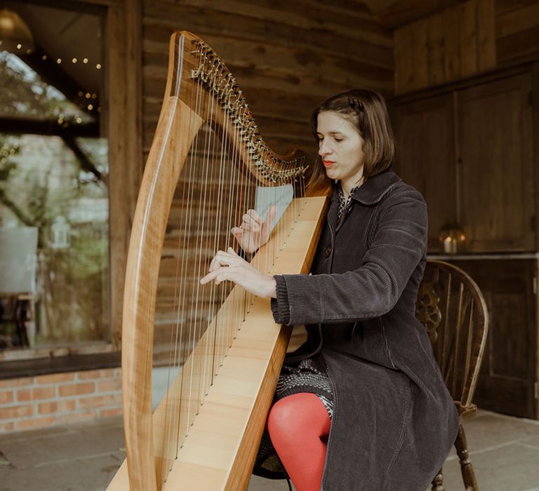 Harpist plays at Nancarrow Farm for rustic wedding day