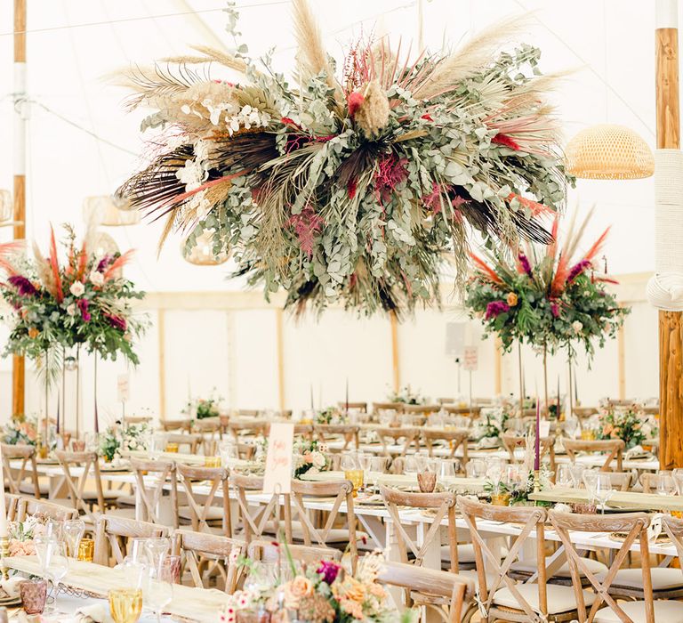 Foliage and flower installations with pampas grass decor