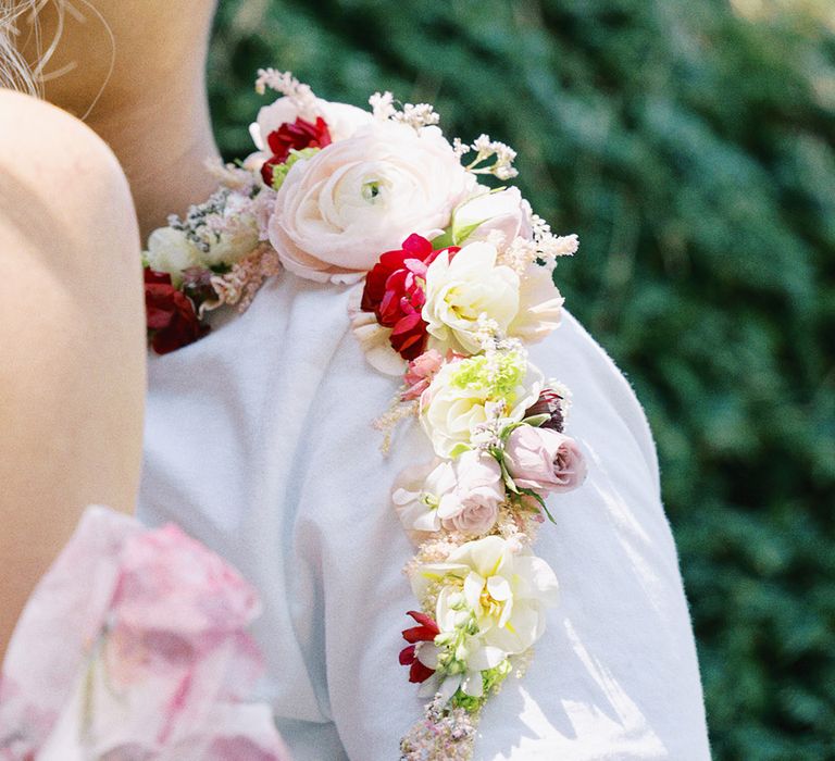 Transgender male in a flower collar 