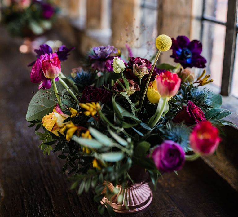 Pink, purple, and yellow wedding flowers for a spring wedding in March at Brinsop Court Manor House and Barn wedding