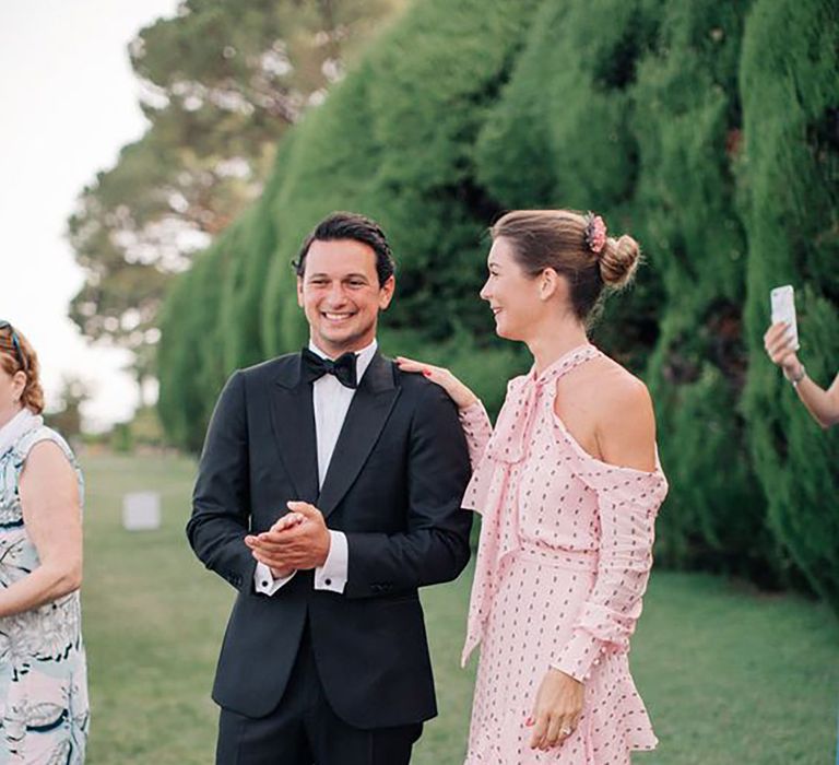 Wedding guests wearing pink polka dot dress and tuxedo at Three Day Ravello Wedding at Villa Cimbrone on Amalfi Coast Italy by M & J Photography