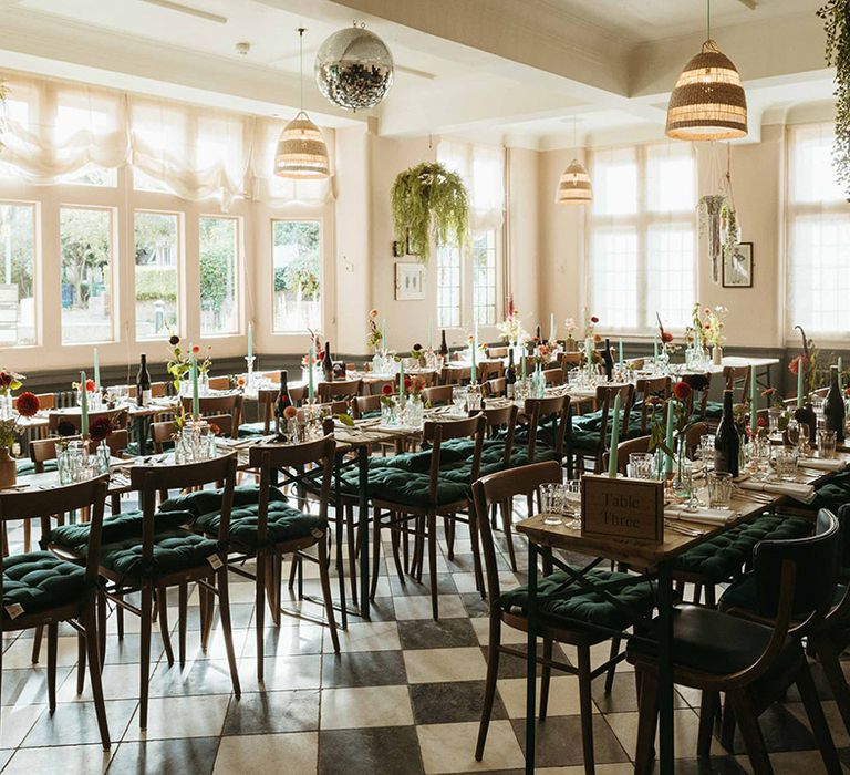 Long banquet tables at The Anchor pub wedding venue with blue table decorations 