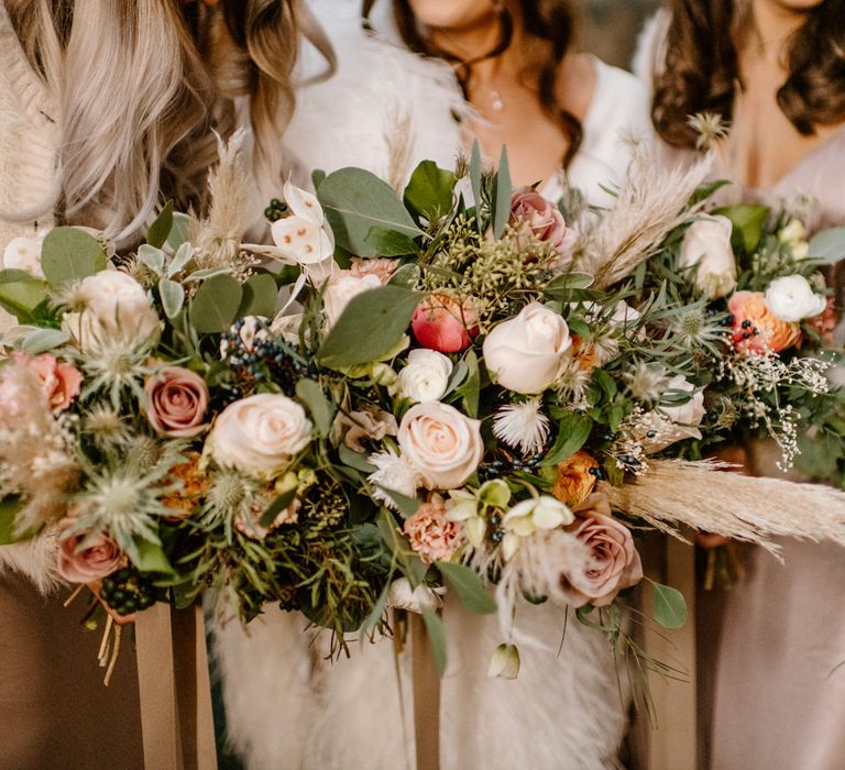 Soft pink bridesmaid bouquets with blush pink roses, eucalyptus and pampas grass 