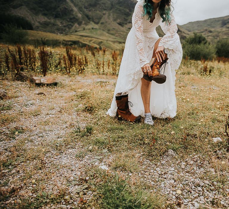 Bride wears brown boots in the Lake District