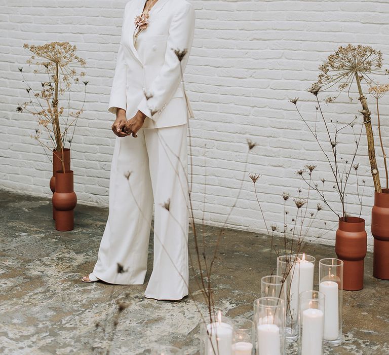 Sleek, modern and elegant bridal suit for an industrial all white wedding