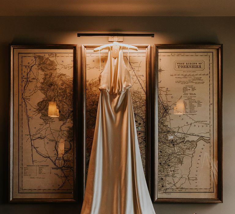 Kate Beaumont champagne colour wedding dress hanging up 