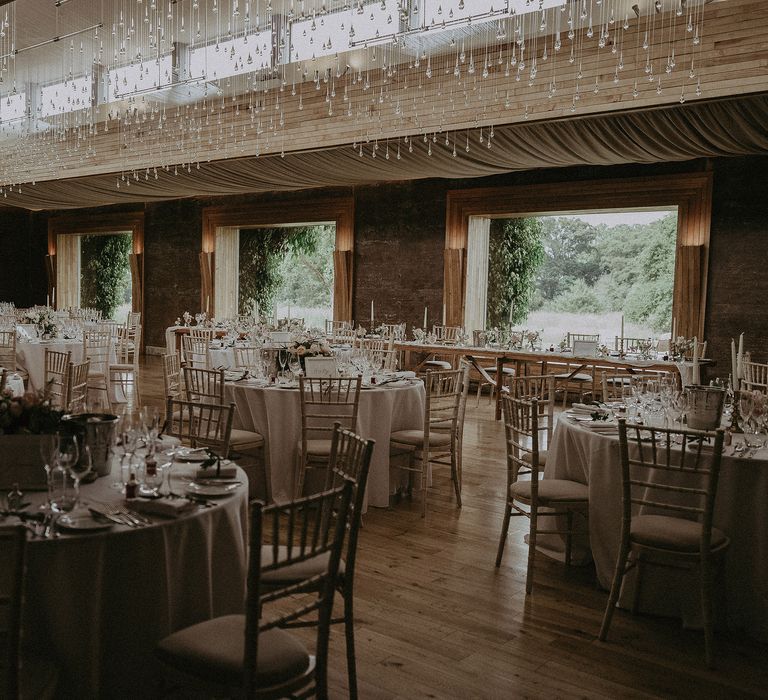 Elmore Court reception room complete with hanging lights and gold chairs