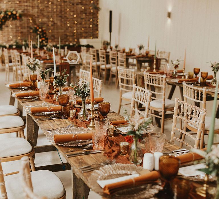 Rust wedding table decor at barn wedding