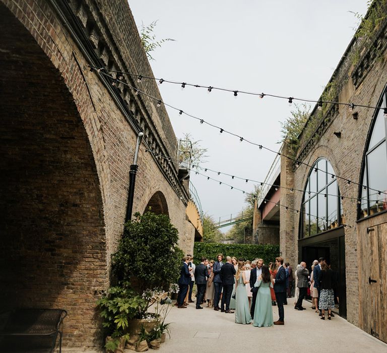 Wedding guests at 100 Barrington wedding venue in Brixton, London