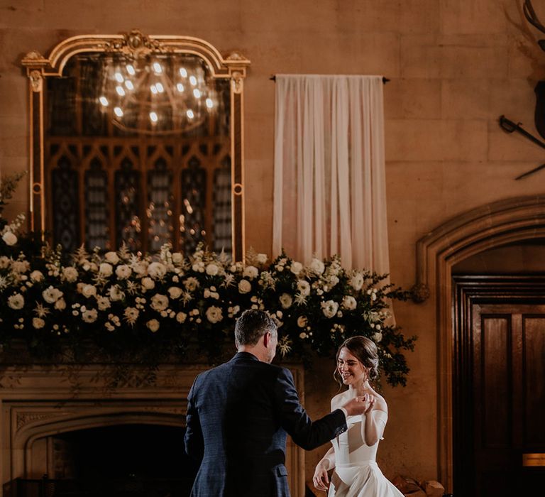 Bride and groom share their first dance together and look like royalty 