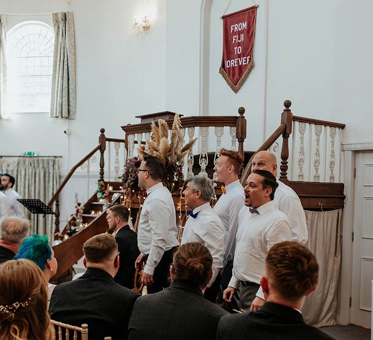 London Gay Men's Chorus surprise singers during the wedding ceremony 