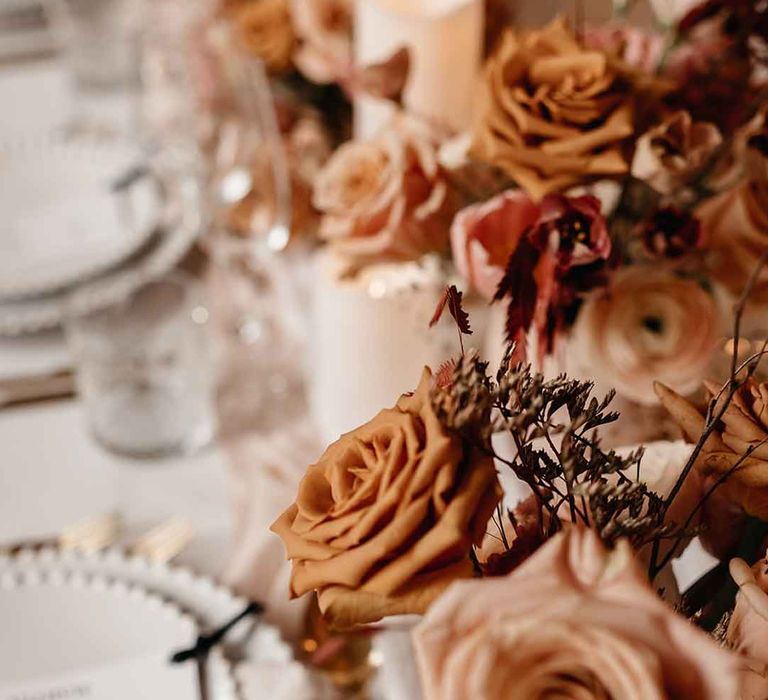 Dried garden rose and dried flower wedding tablescape centrepieces 