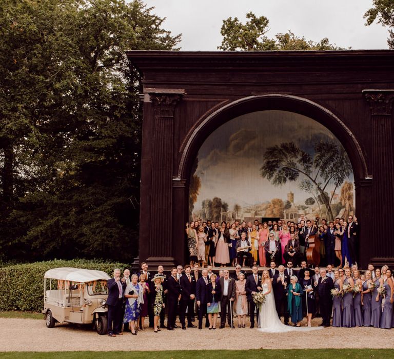 Guests gather outside at Larmer Tree Gardens Wedding