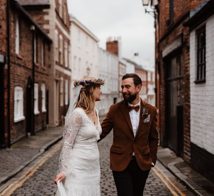 Boho bride and groom portraits in cobbled street by Taylor-Hughes Photography