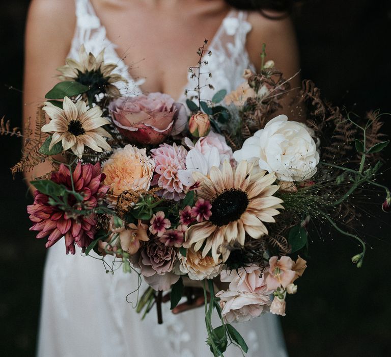 Wedding bouquet with dusky pink, yellow and ivory wedding flowers 