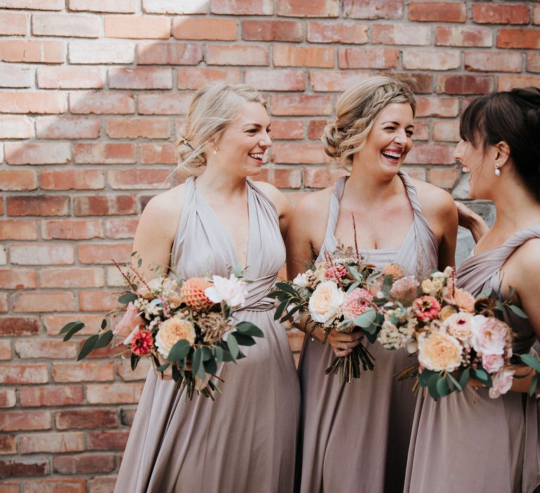 Bridesmaids in dusky pink bridesmaid dresses 