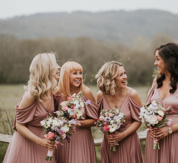 bridesmaids in dusky pink dresses 