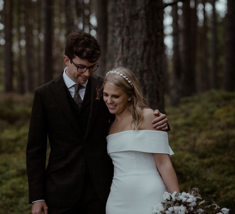 Bride & groom walk together on the morning of their wedding