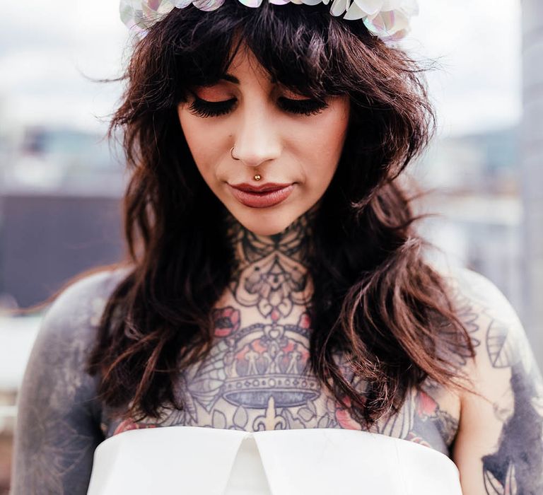 Bride with a fringe wearing an appliqué alternative wedding headband 