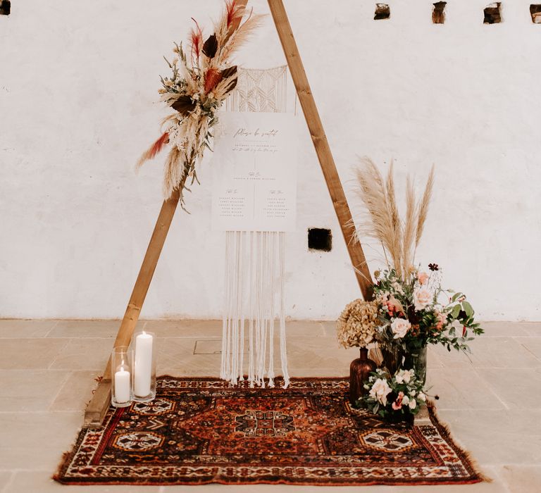 Wooden wedding arch with pampas grass decor 