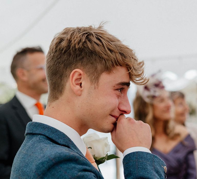 Groom becomes emotional on his wedding day whilst watching his bride walk down the aisle