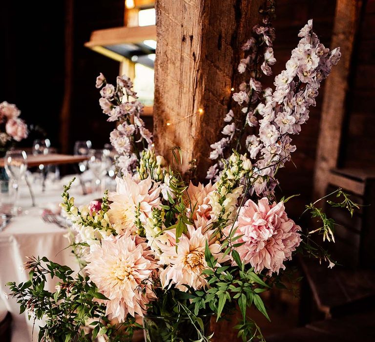 Beautiful pastel wildflower displays at wedding