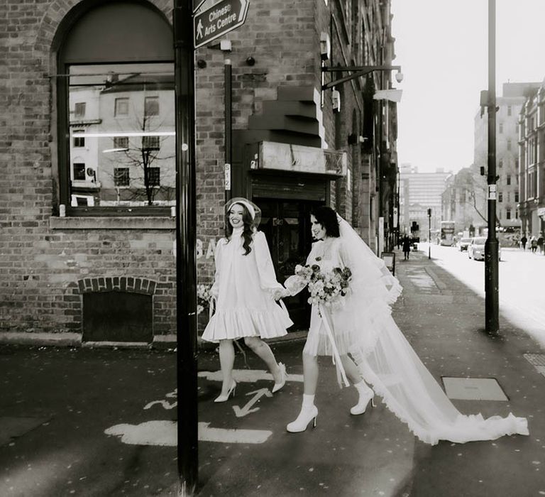 Manchester elopement with brides in short wedding dress long veil and berret combo 