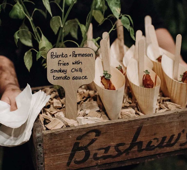 Hors d'oeuvres for wedding guests with polenta and parmesan fries