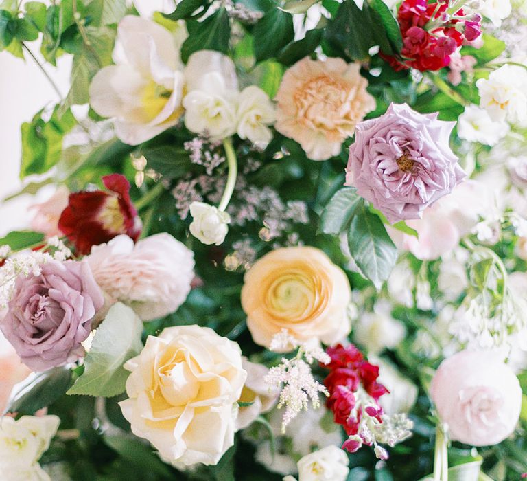 lemon, lilac, pink and white roses and ranunculus flowers 