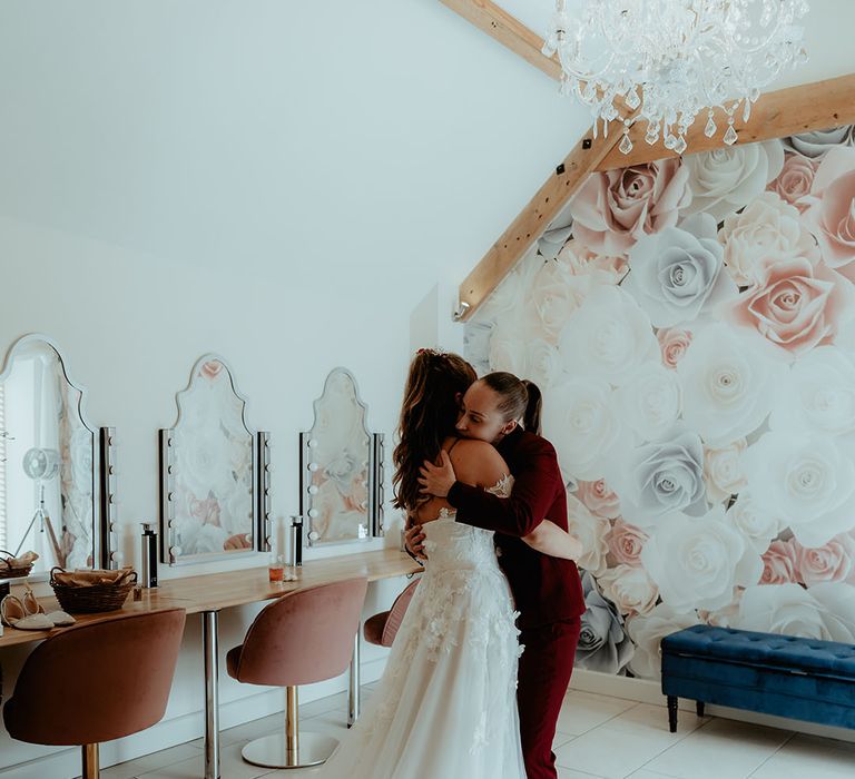 Brides get their first look at each other before their rustic barn wedding 