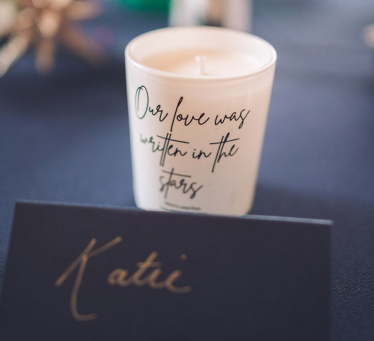 Candle wedding favours created by the bride with their wedding slogan on 