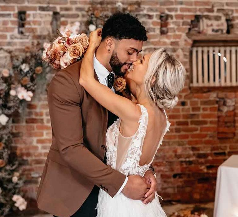 Bride and groom dancing at rustic luxe wedding at Lodge Farm Essex wedding venue 