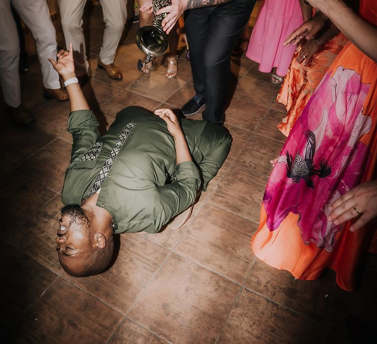 Guests dancing at Restaurant Park Hvar wedding reception with saxophonist 