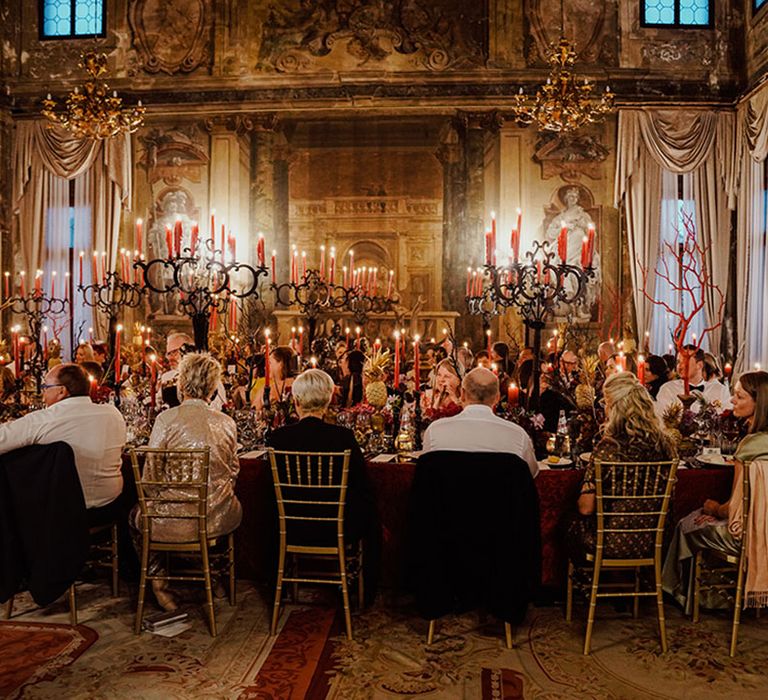 Wedding guests sitting at the wedding breakfast at destination wedding in Italy 