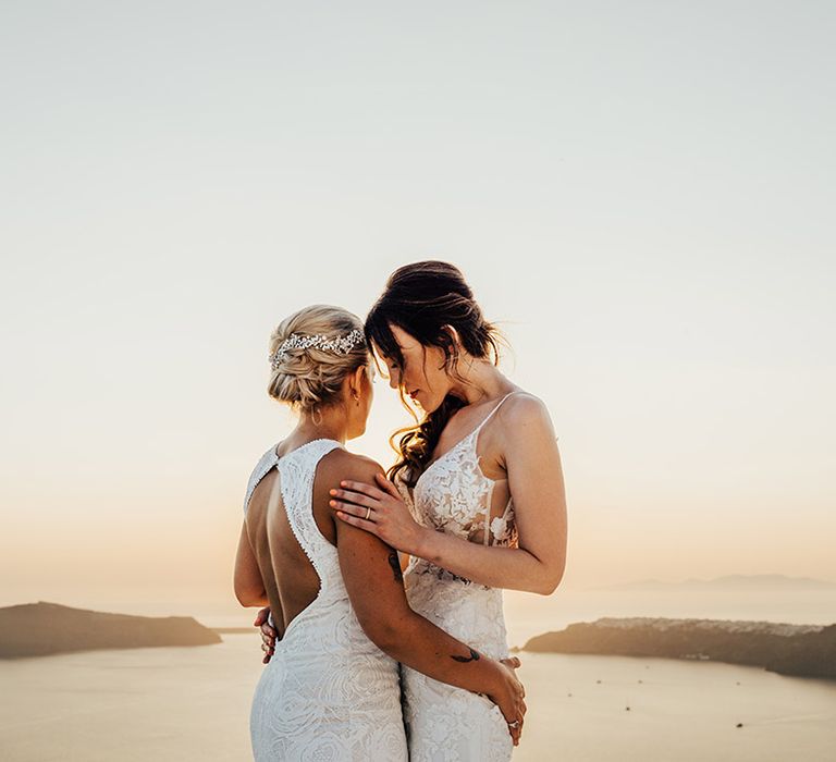 Sunset wedding couple portrait for two brides at their lesbian LGBTQI+ wedding 