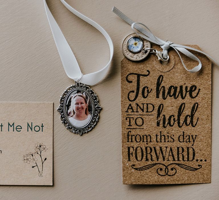 Lovely way to remember loved ones that have passed away with a photo charm for the bride's bouquet 