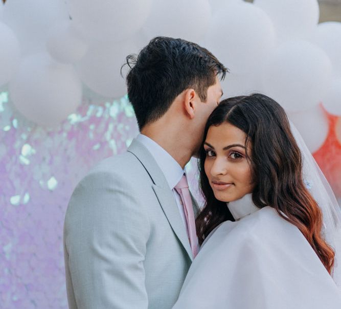 Bride in ruffle wedding dress