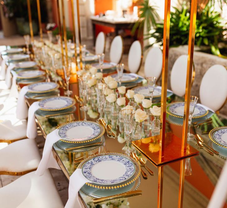 White and gold place settings at intimate Euridge Manor reception 