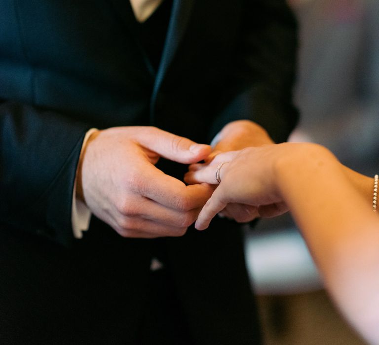 Exchange of wedding rings photo shot by Nkima Photography