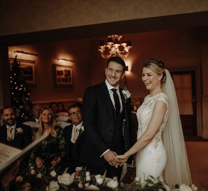 Warm and cosy Christmas wedding ceremony at Inn on the lake wedding