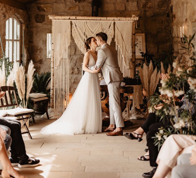 Bride and Groom just married kissing