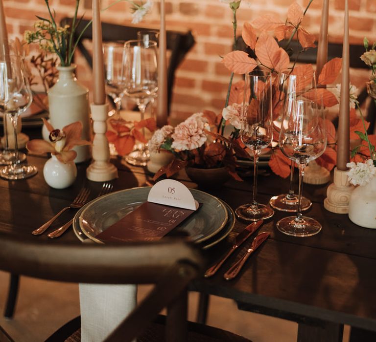 Floral tablescape setting for rustic wedding at Reymerston Hall