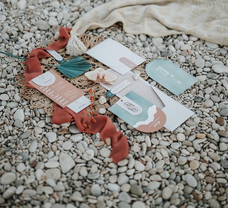 Wedding stationery suite in seafoam and coral tones for Italian beach wedding 