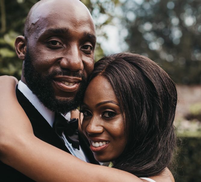 Intimate wedding portrait of a Black bride and groom at their classic wedding 