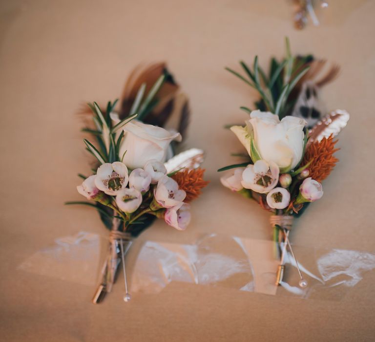 Dainty floral buttonholes for Groom and Groomsmen 