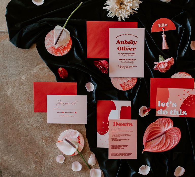 Red and pink contemporary stationery suite