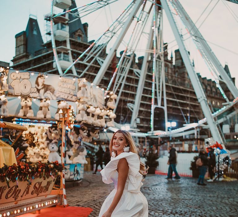 Bride in an organza Daniel Chu wedding dress with ruffle sleeves