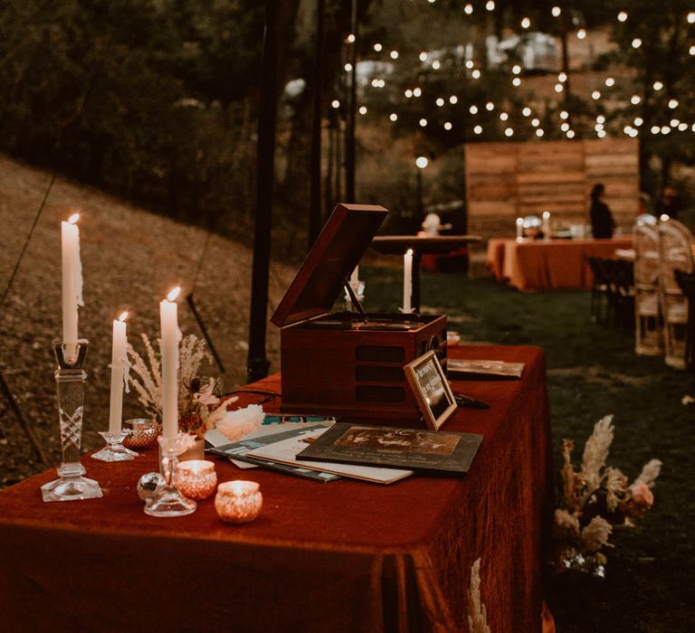 Outdoor table complete with deep red cloth