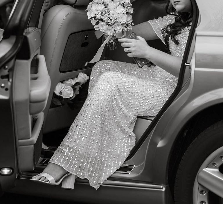 Bride leaves car on her wedding day